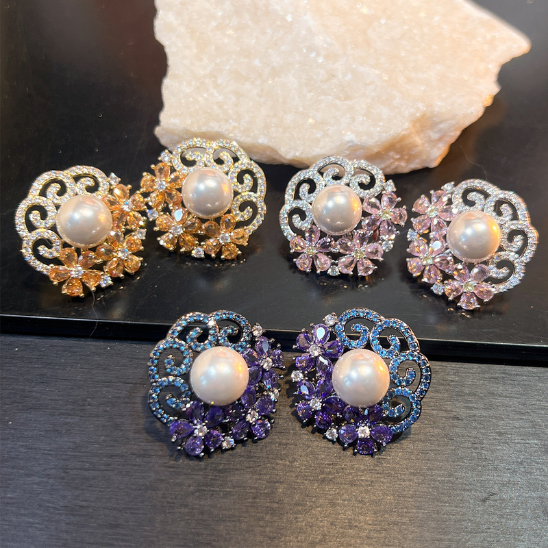 Vintage Fashion Center - Vintage holle bloem oorknopjes met imitatieparel