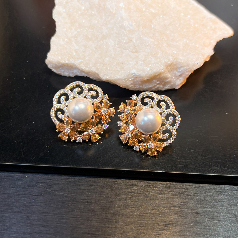 Vintage holle bloem oorknopjes - Vintage Fashion Center recensie en prijs